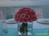 pink rose centerpiece in kotako vases
